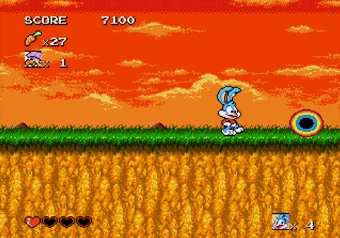 Enter the rainbow portal to access a bonus stage Buster Bunny standing next to a rainbow portal in Tiny Toon Adventures: Buster's Hidden Treasure